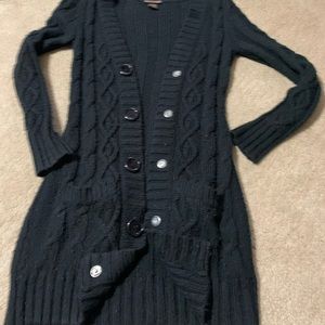 Thigh length black sweater